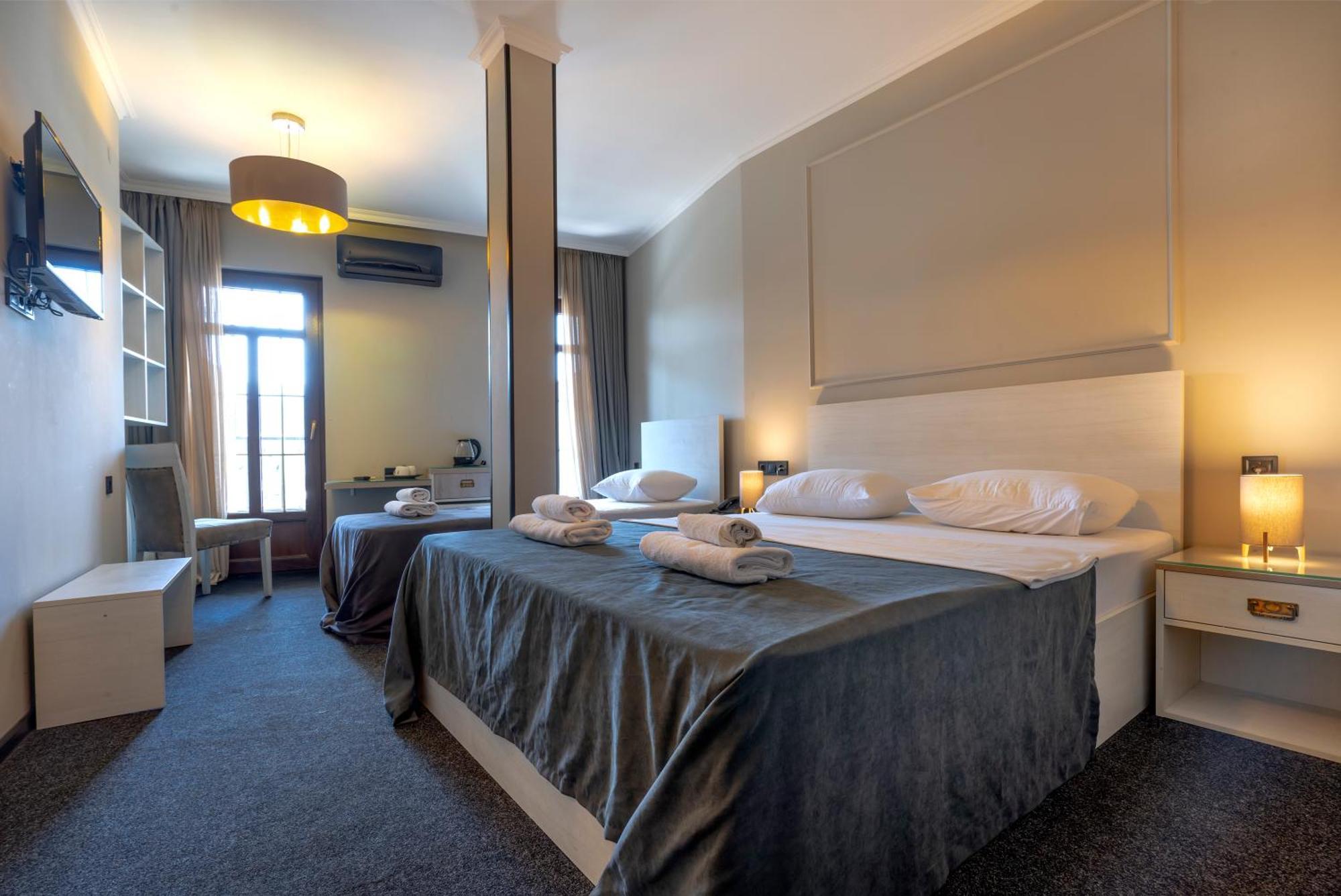 Hotel Piazza Tbilisi Pokoj fotografie