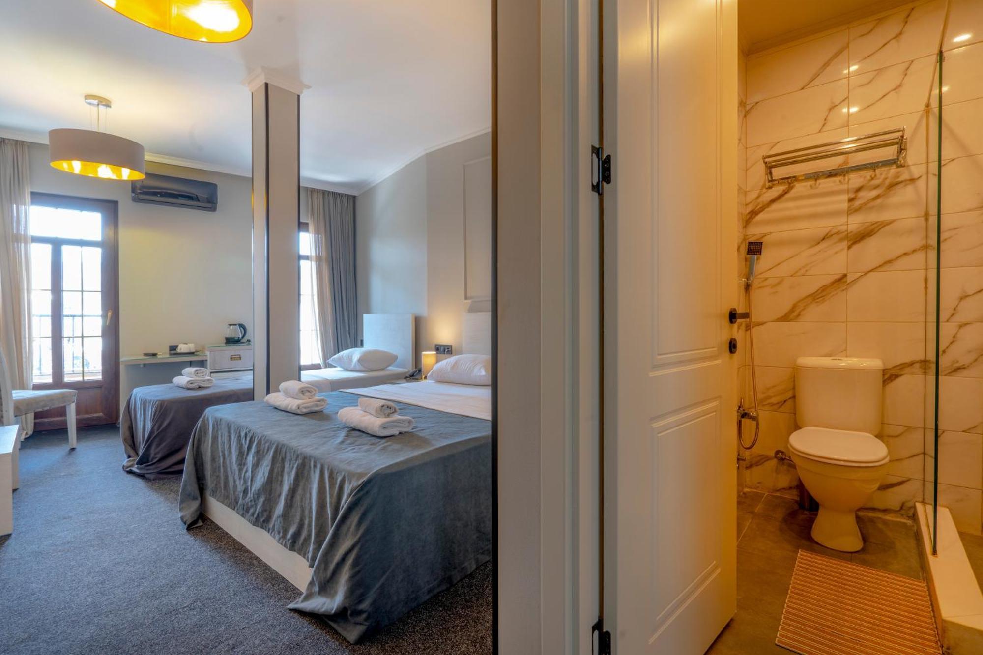 Hotel Piazza Tbilisi Pokoj fotografie